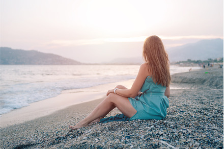 Woman in Flowing Dress on Seaside, a Person Photo by Jan Jack Russo Media