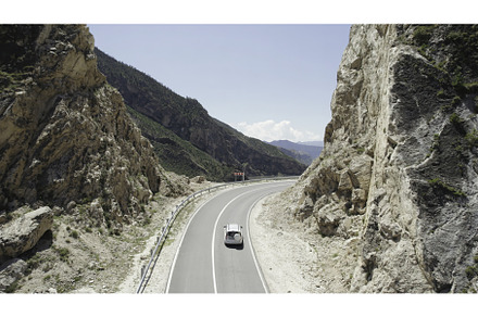 Top view of mountain road with, a Transportation Photo by Media Whale Stock