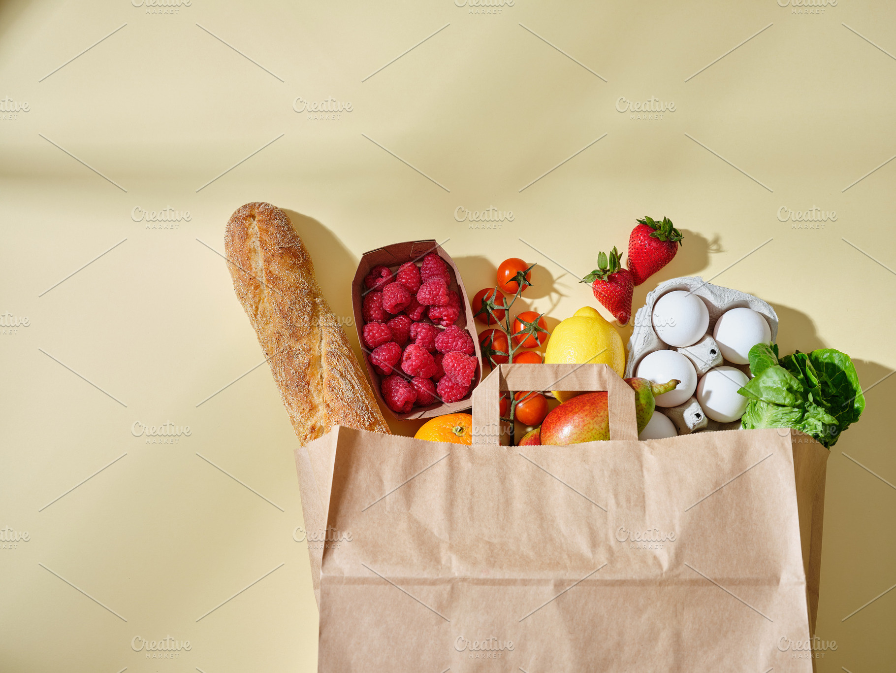 Full paper grocery bag with healthy products. Organic food conce, a Food & Drink Photo by Asya Nurullina