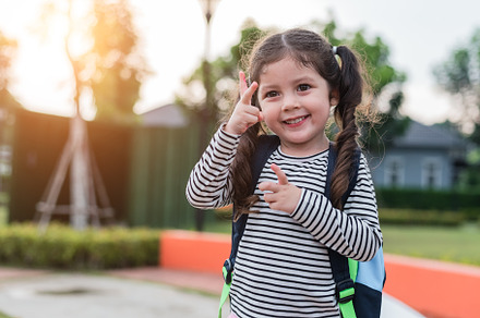 Happy little girl enjoy going to school. Back to school and Educ, a Person Photo by Ministocker