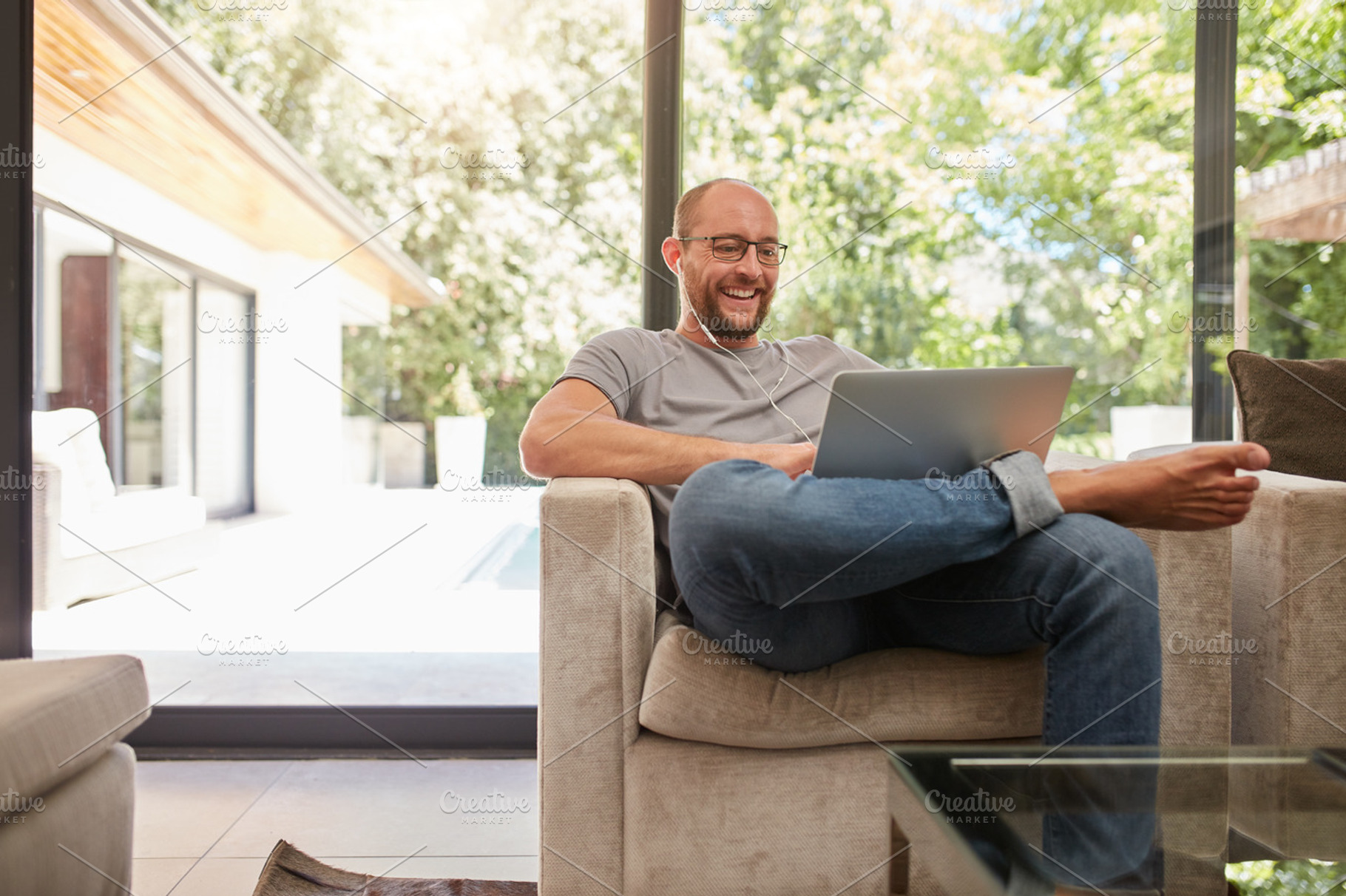 Happy mature man having video call, a Person Photo by Jacob Lund