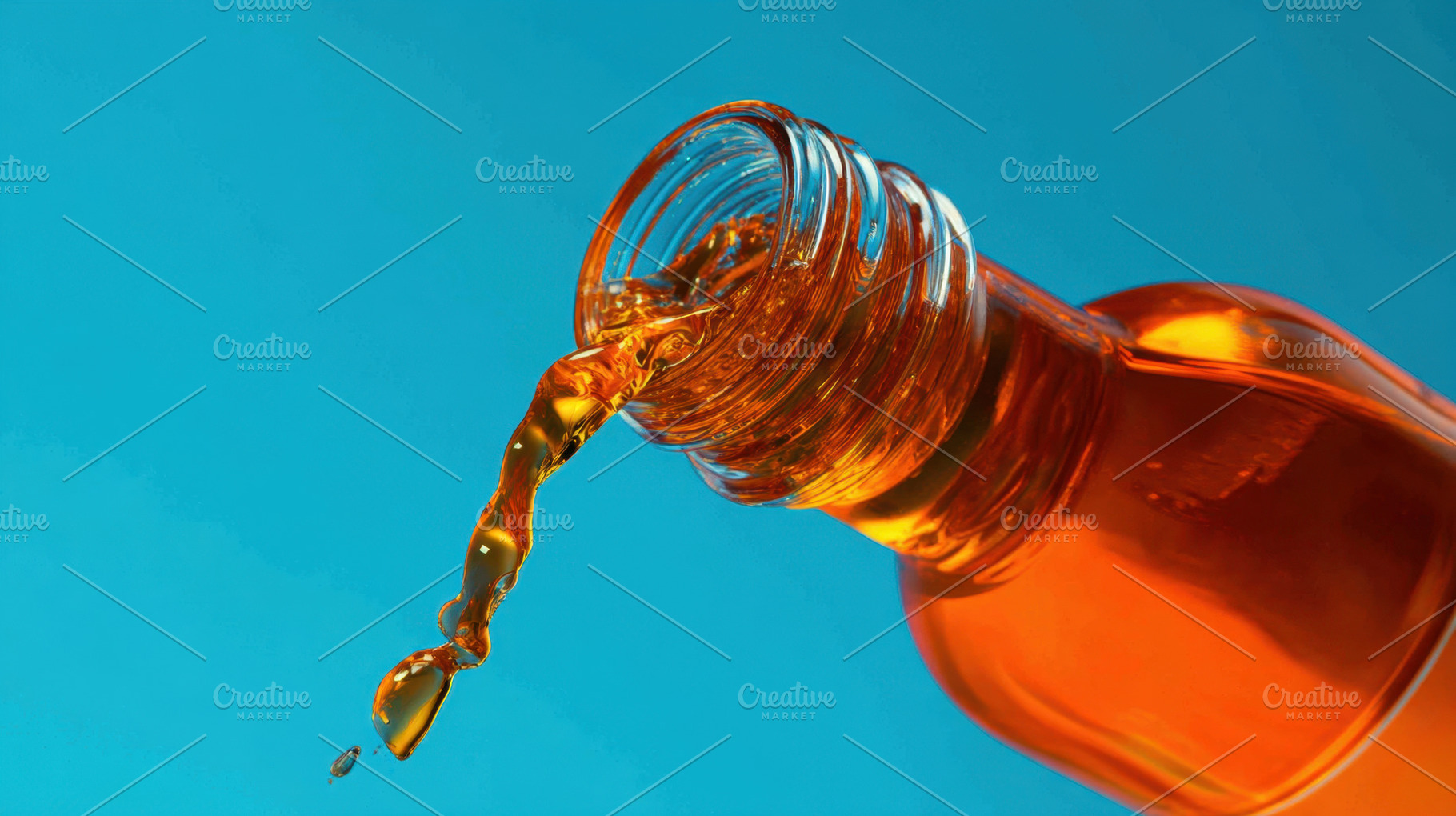 Liquid pouring from a bottle, a Photo by Beautiful things