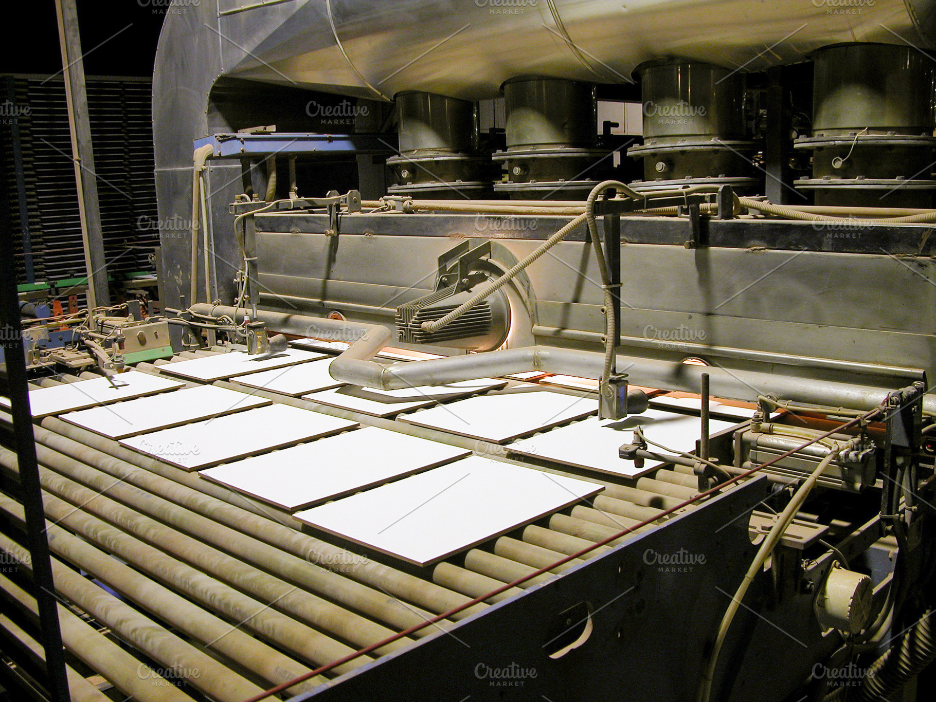 Ceramic Tiles Entering Industrial Kiln Conveyor, an Industrial Photo by Davizro's Market