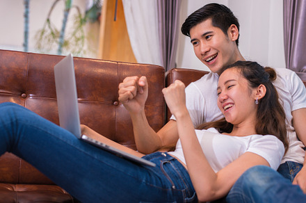 Asian young couples using laptop. Lovers and Couples concept. Ho, a Person Photo by Ministocker