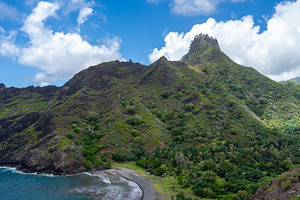 Coastal cliffs and turquoise bay near Puamau, Hiva Oa, Marquesas, a Nature Photo by GoodGoods