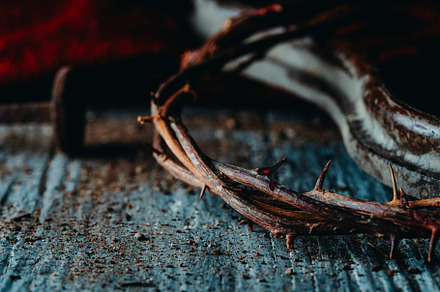 nail and crown of thorns with fresh blood, a Photo by Nito