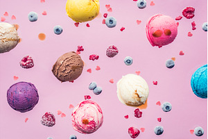 Falling ice cream scoops on pink