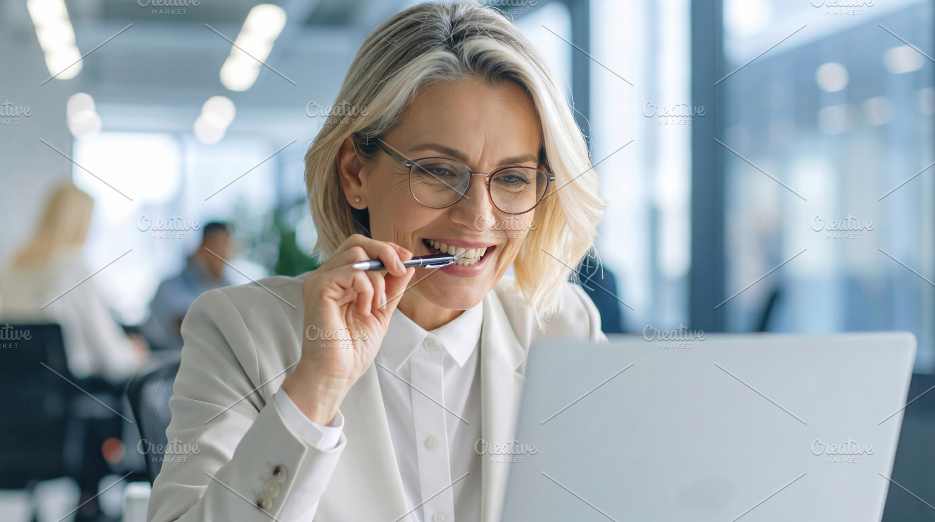 Focused Businesswoman Working On Laptop, a Business Photo by Davizro's Market