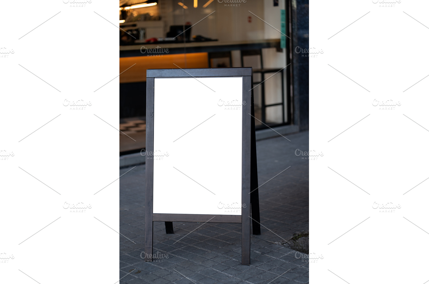 Blank wooden frame sign on sidewalk, a Business Photo by volodymyrshtun13795