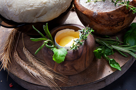 Pizza dough with egg, herbs and flour