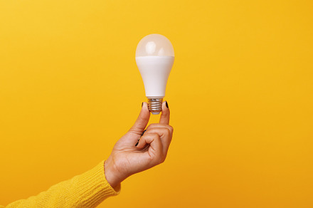 Light bulb in hand containing background, bright, and bulb, a Technology Photo by Ales Munt