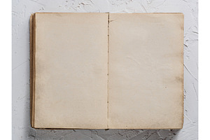 Open book blank on white concrete background stock photo containing old and, a School & Education Photo by Fascinadora