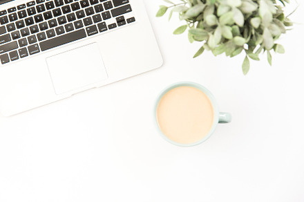 Laptop + Coffee Stock Image