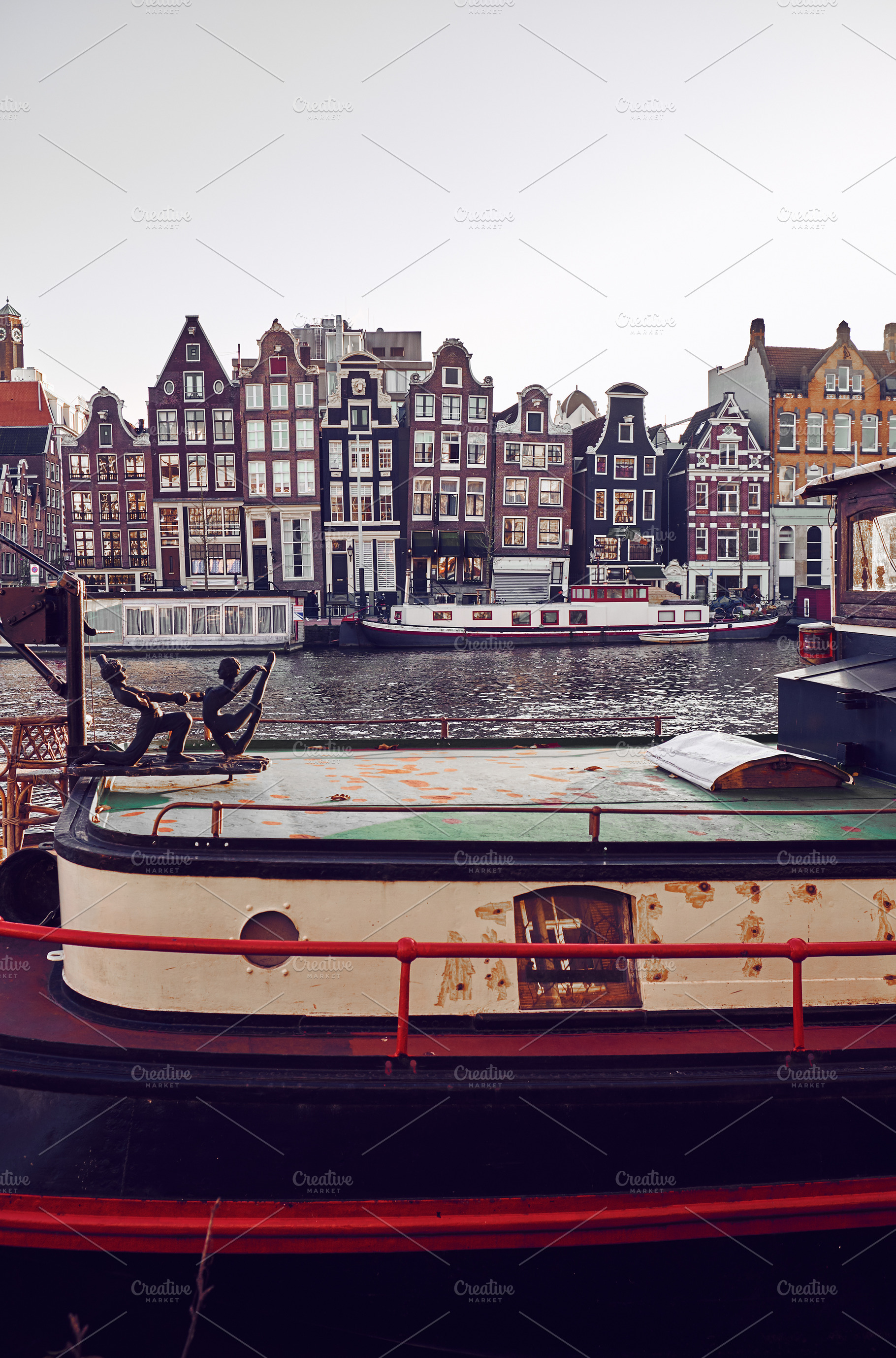 View of the canals  in amsterdam containing amsterdam, netherlands, and city, an Architecture Photo by badahos