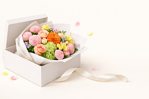 dopamine Bouquet of colorful flowers in gift box with scattered, a Photo by Dvoevnore photos