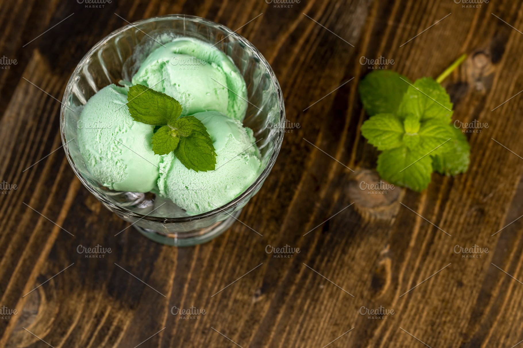 delicious green cold ice cream with mint flavor and smell, a Photo by rsoollAI