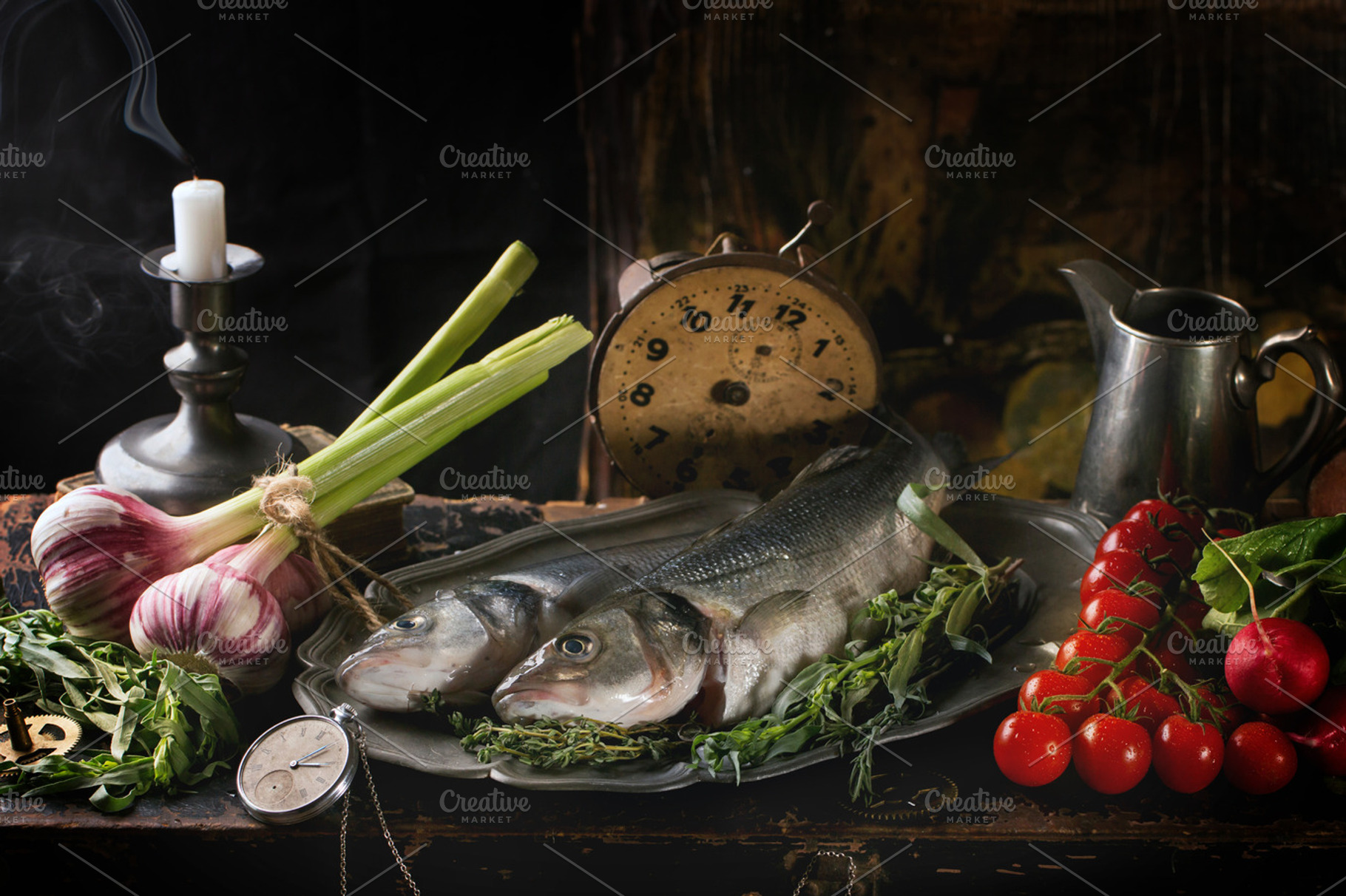 Still life with raw fish stock photo containing fish and vegetables