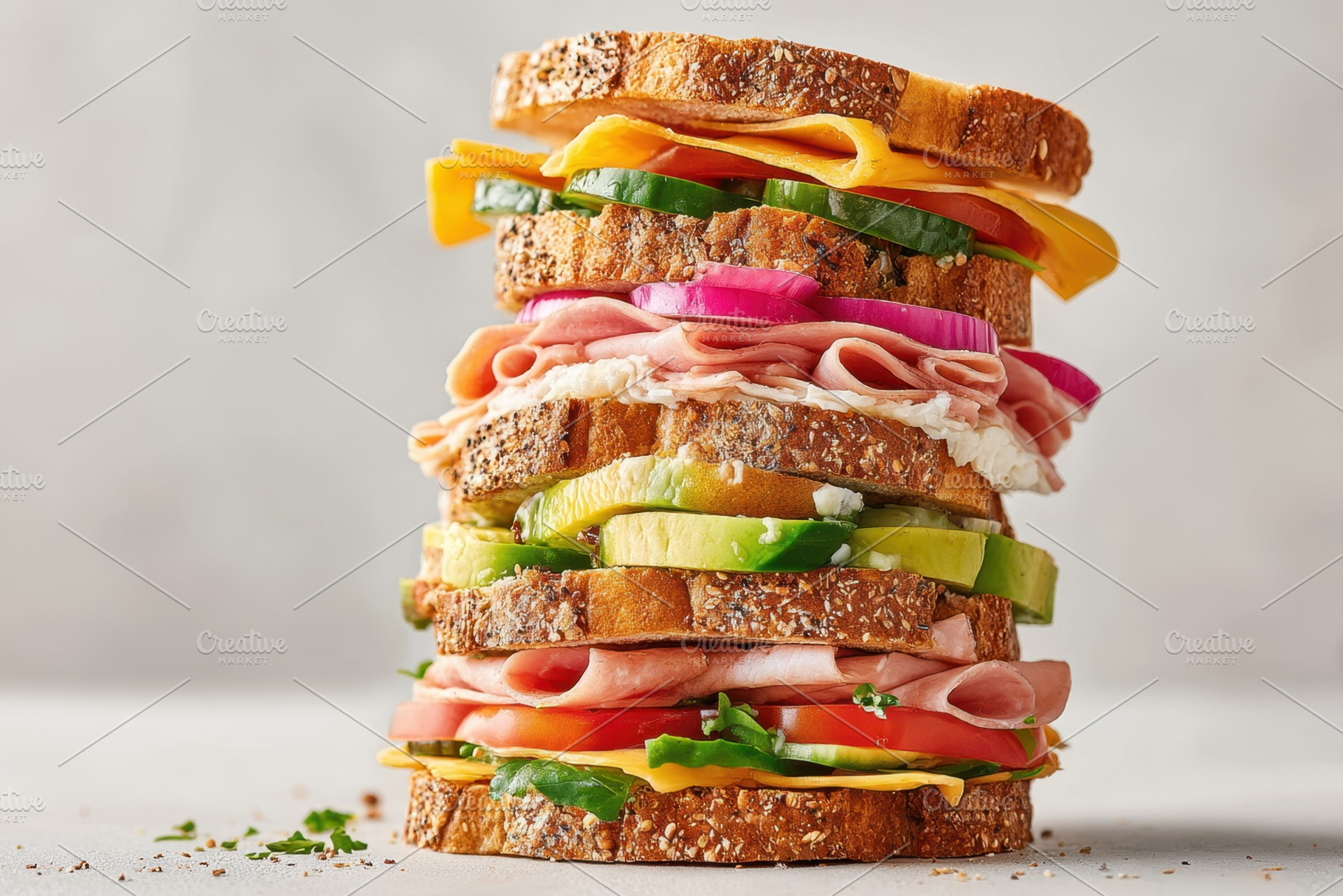 Tall layered deli sandwich with avocado and cheese, a Food & Drink Photo by AlyaAnd