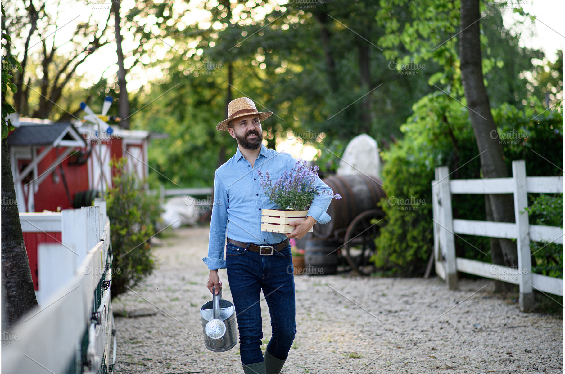 Portrait of farmer holding lavender, a Person Photo by HalfPoint
