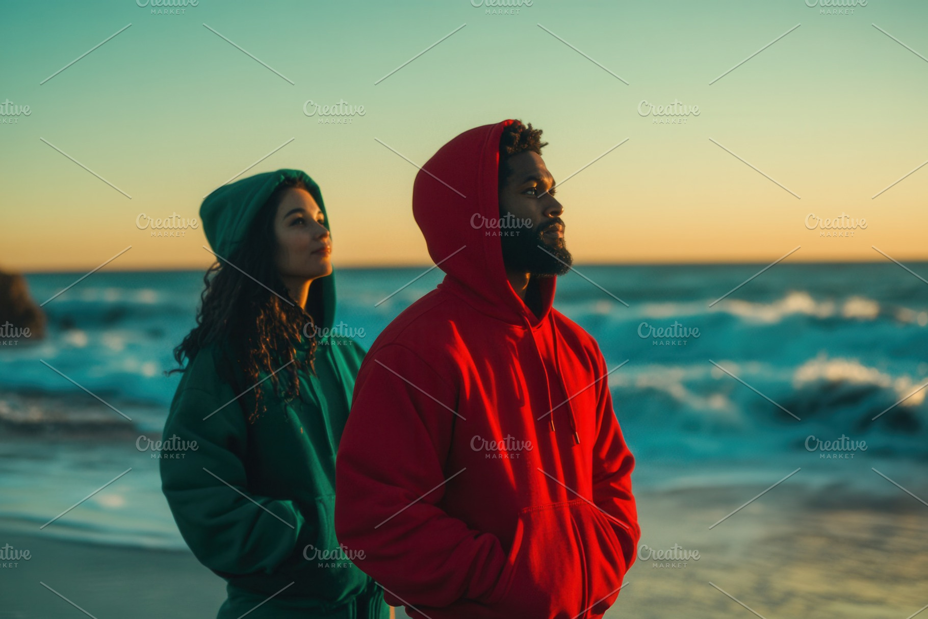 A man and woman in colorful hoodies, a Photo by Pavel_design