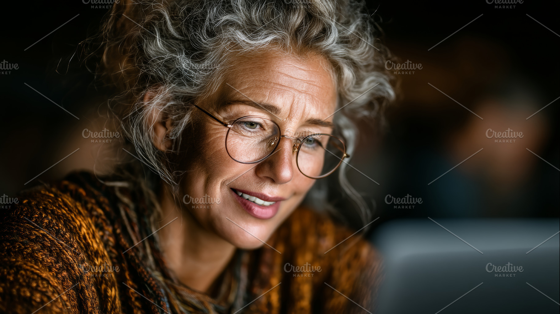 Mature woman learning on laptop at home smiling as she uses technology for onli, a Photo by AS photostudio