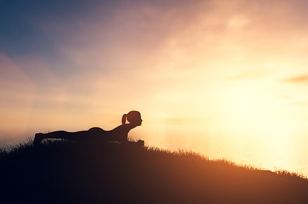 Woman in yoga pose at sunset., a Health & Medical Photo by Photocreo Michal Bednarek