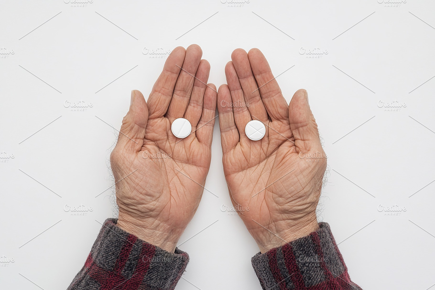 Mature hands with medicine pills, a Health & Medical Photo by AlyaAnd