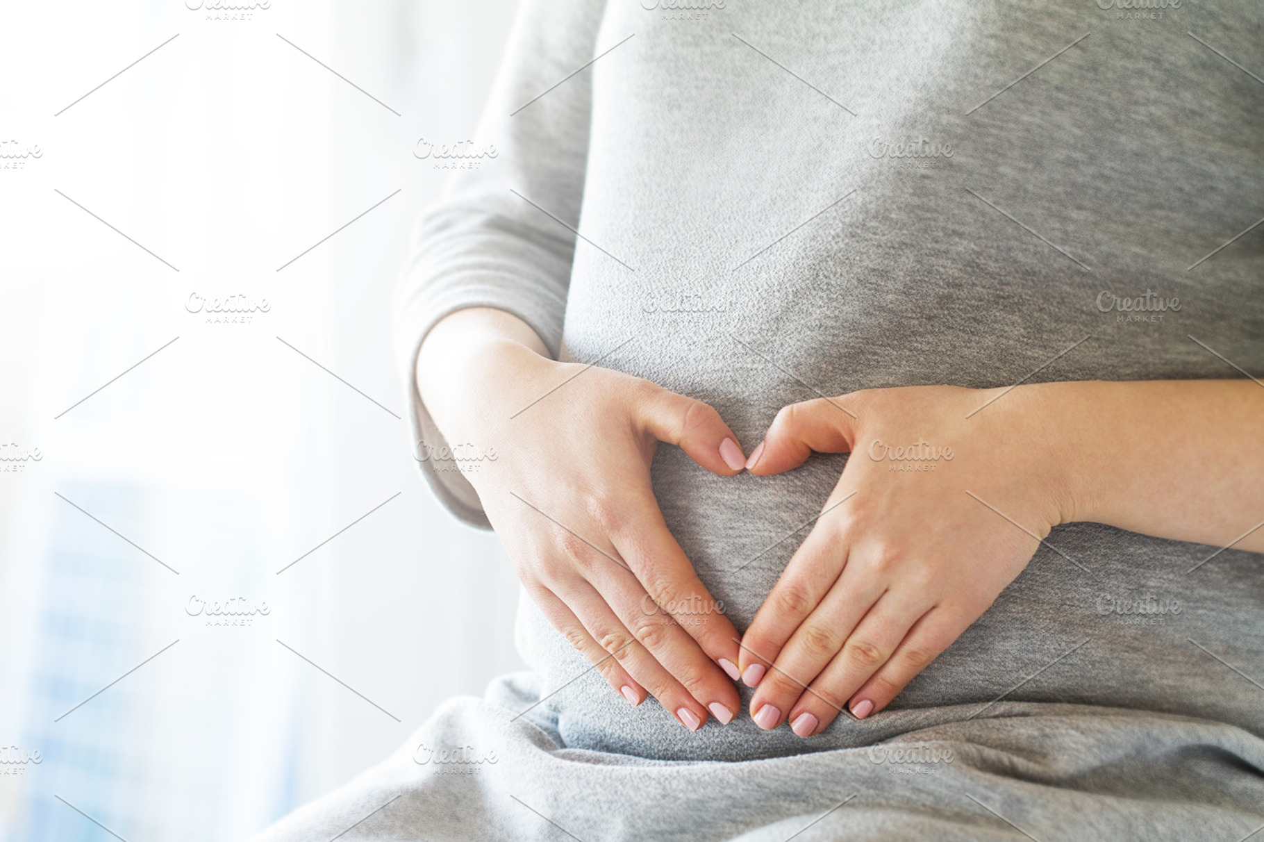 Maternity or love concept with woman stock photo containing pregnant and belly, a Person Photo by Valeria Art