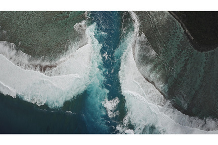 Turquoise water flowing between two, a Nature Photo by Goinyk