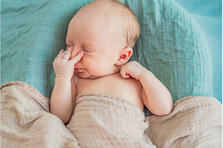 The baby is sleeping peacefully in