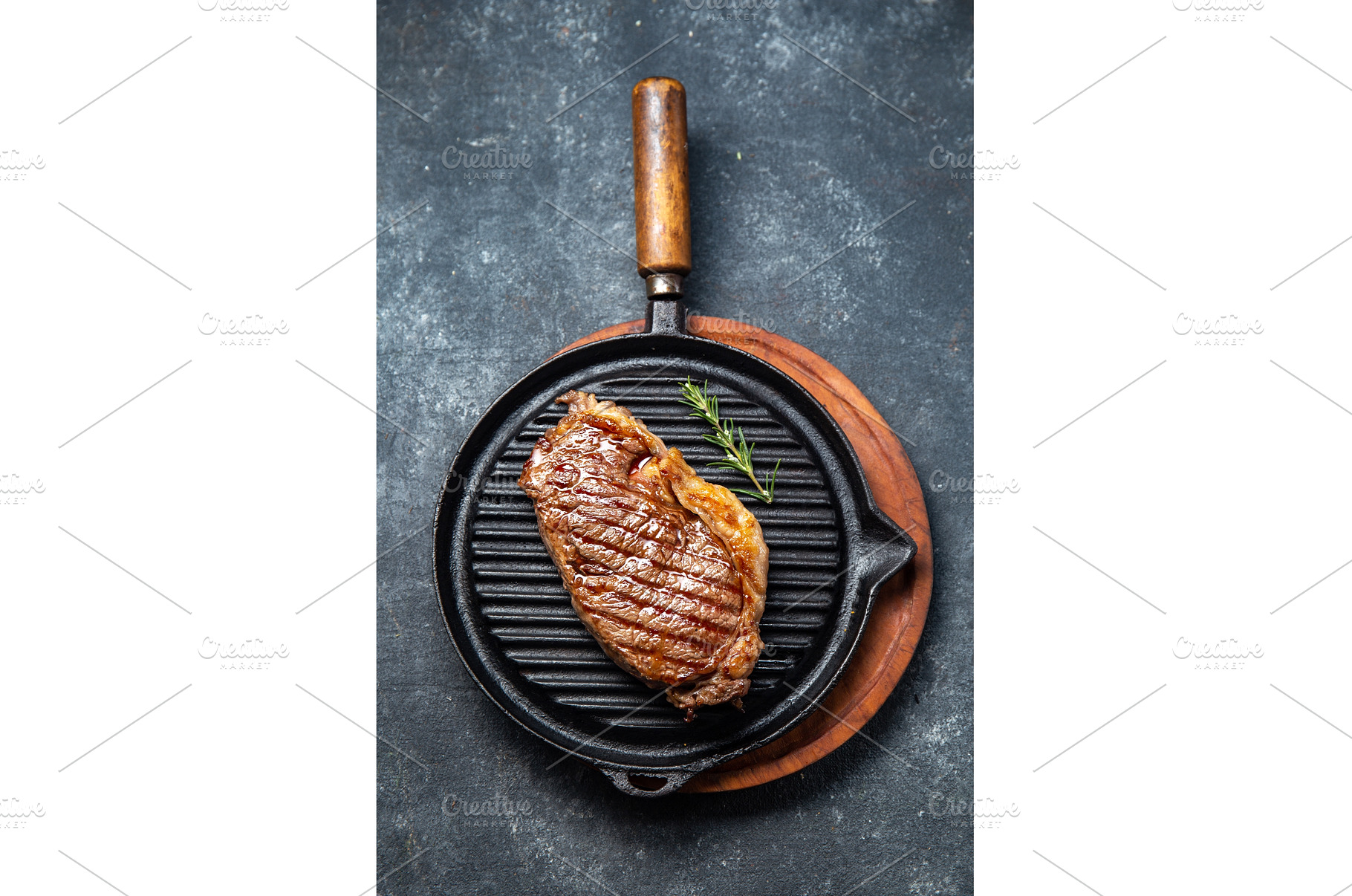 Fried strip loin steak on vintage, a Food & Drink Photo by LARISA BLINOVA