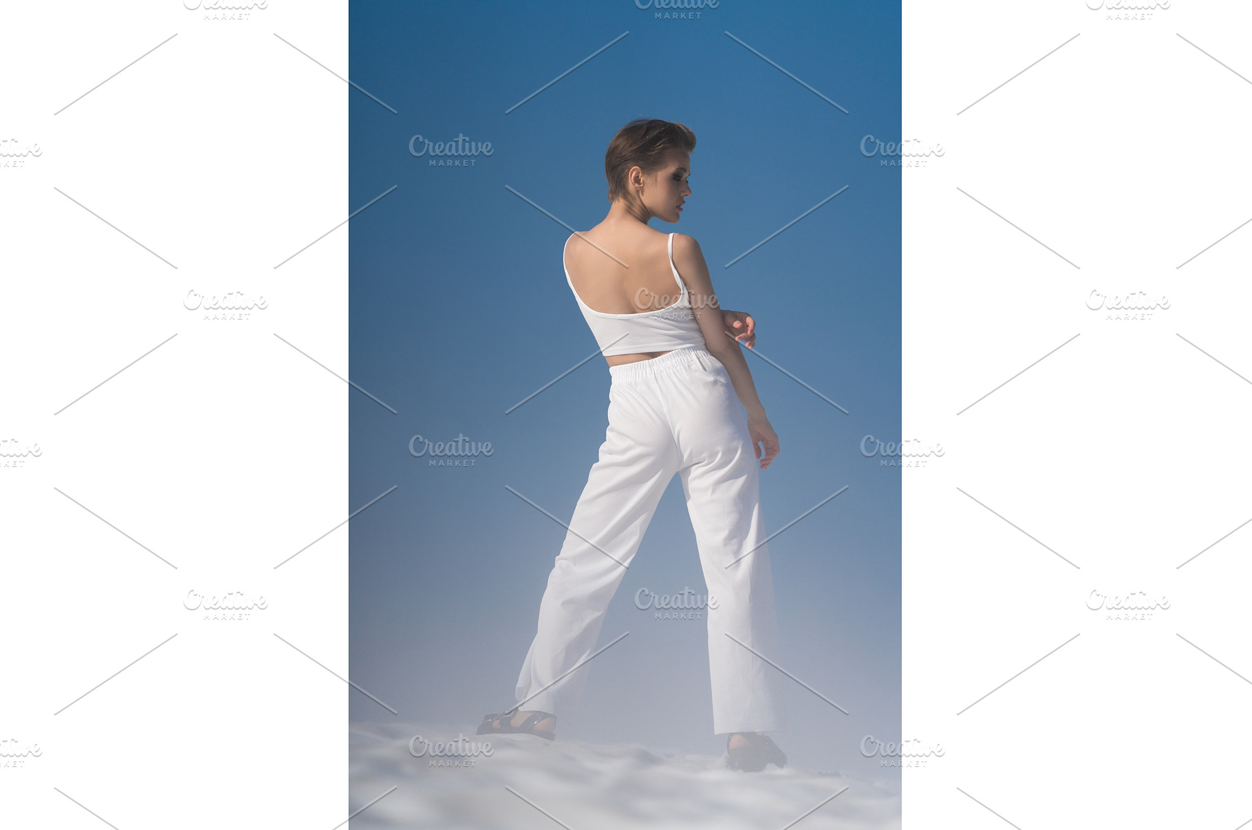 Back view of sensual model standing, a Beauty & Fashion Photo by Alexander-Piragis