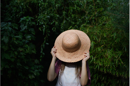 Unrecognizable little girl in hat, a Person Photo by HalfPoint