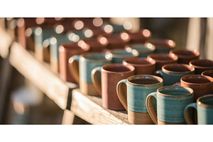 Handcrafted ceramic mugs in various, an Illustration by tilialucida