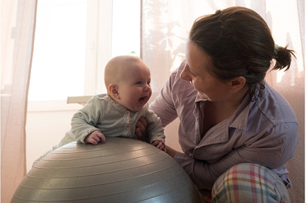 Mother and her baby girl having fun, a Sports & Recreation Photo by Koldunova