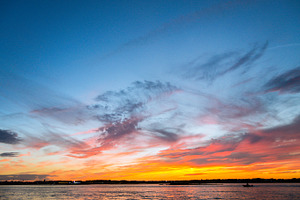 Ocean city stock photo containing sunrise and surfer