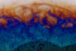 Vivid abstract swirls of blue, orange, and turquoise create a dy, a Background Photo by Ales Munt