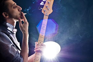 Man with a guitar stock photo containing studio and guy