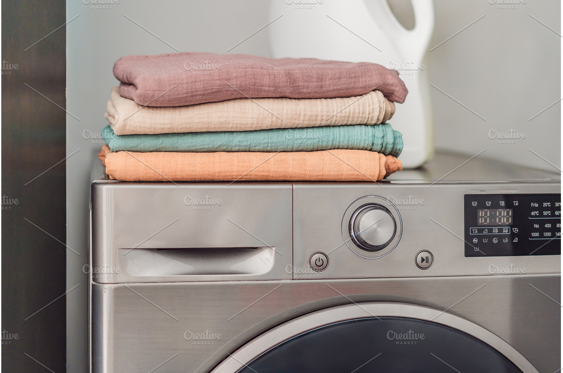 Stack of soft muslin baby swaddles, a Background Photo by Elizaveta Galitskaya
