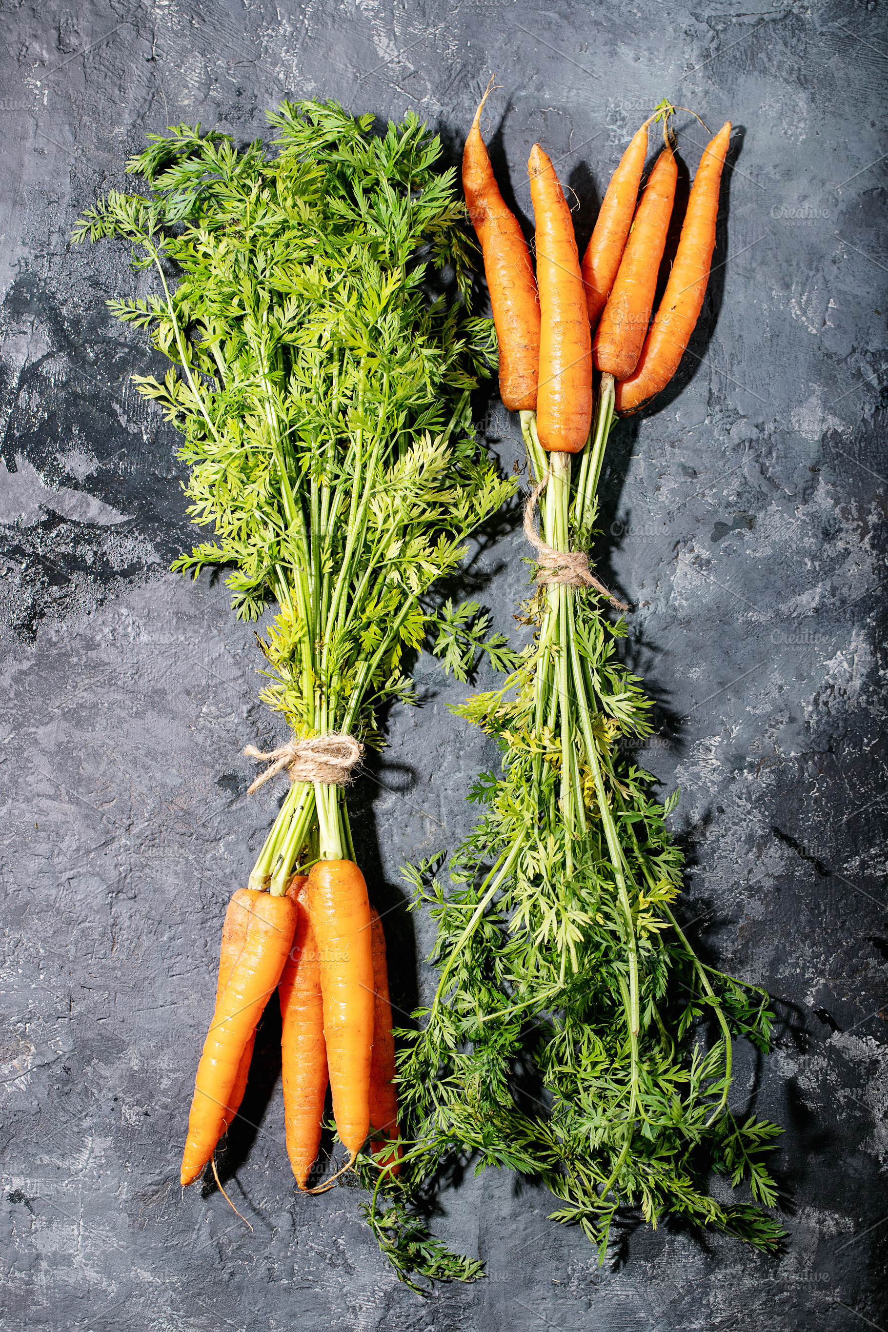 Bunch of fresh carrots with green le stock photo containing carrot and organic, a Food & Drink Photo by RomanDebree
