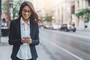 Woman walking containing business, woman, and walking