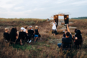 non-standard wedding ceremony in a stone quarry field, a Person Photo by Weddings, People, Travel