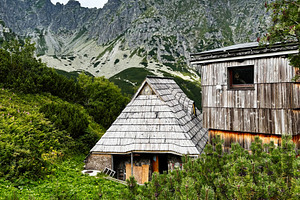 Scenic mountain huts in Zakopane Poland surrounded by lush greenery and rugged, a Nature Photo by AS photostudio