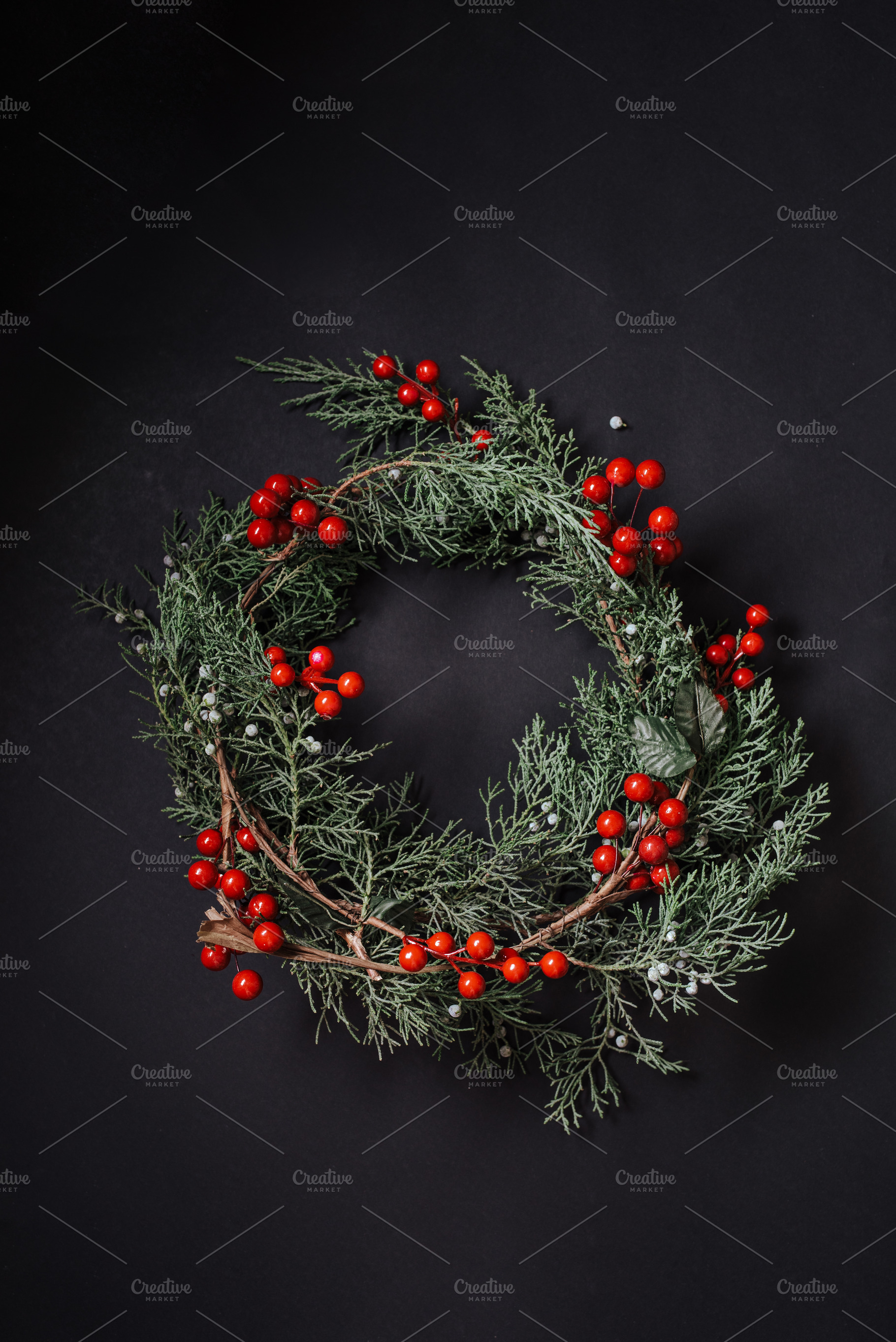 Christmas wreath detail of evergreen containing wreath, christmas, and berries, a Holiday Photo by SZ IMAGE
