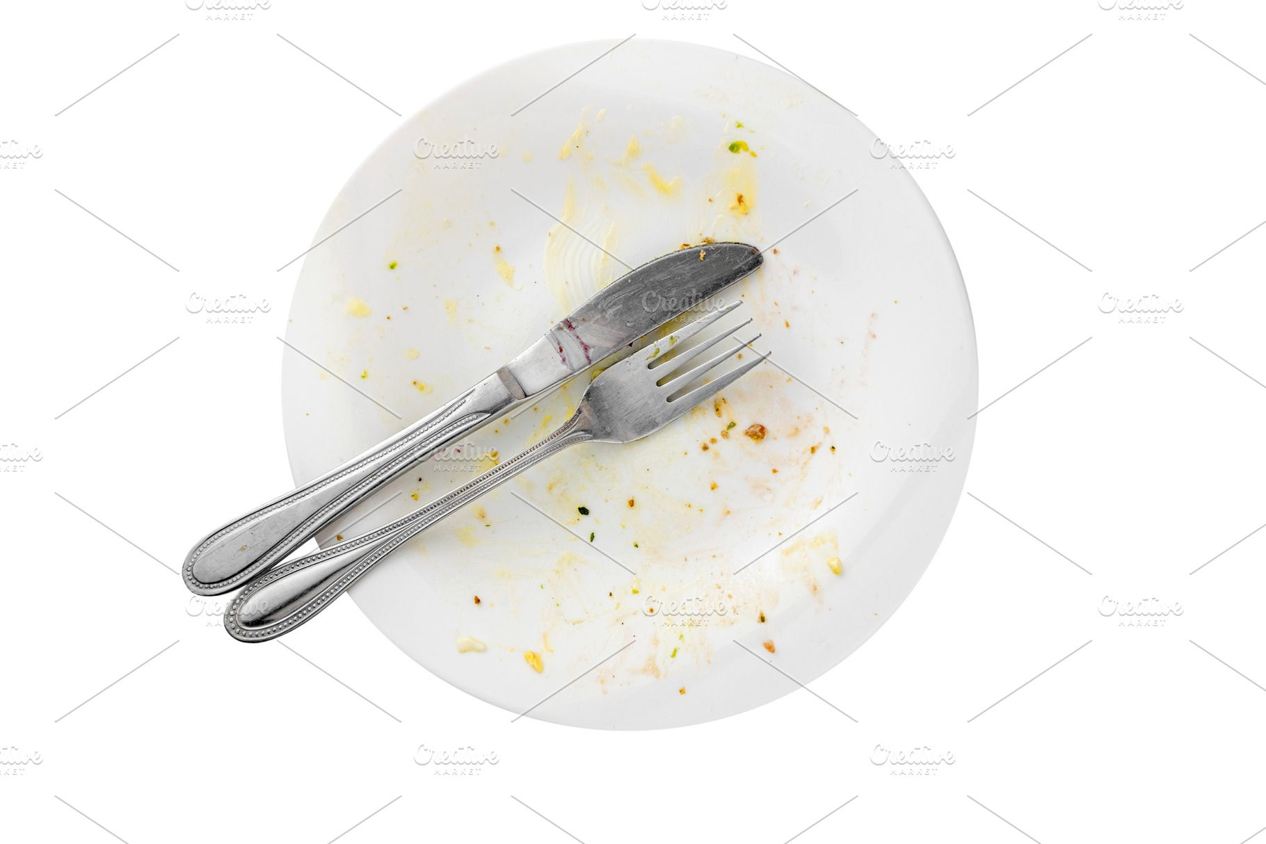 Empty dirty food plate isolated, a Food & Drink Photo by BOOCYS