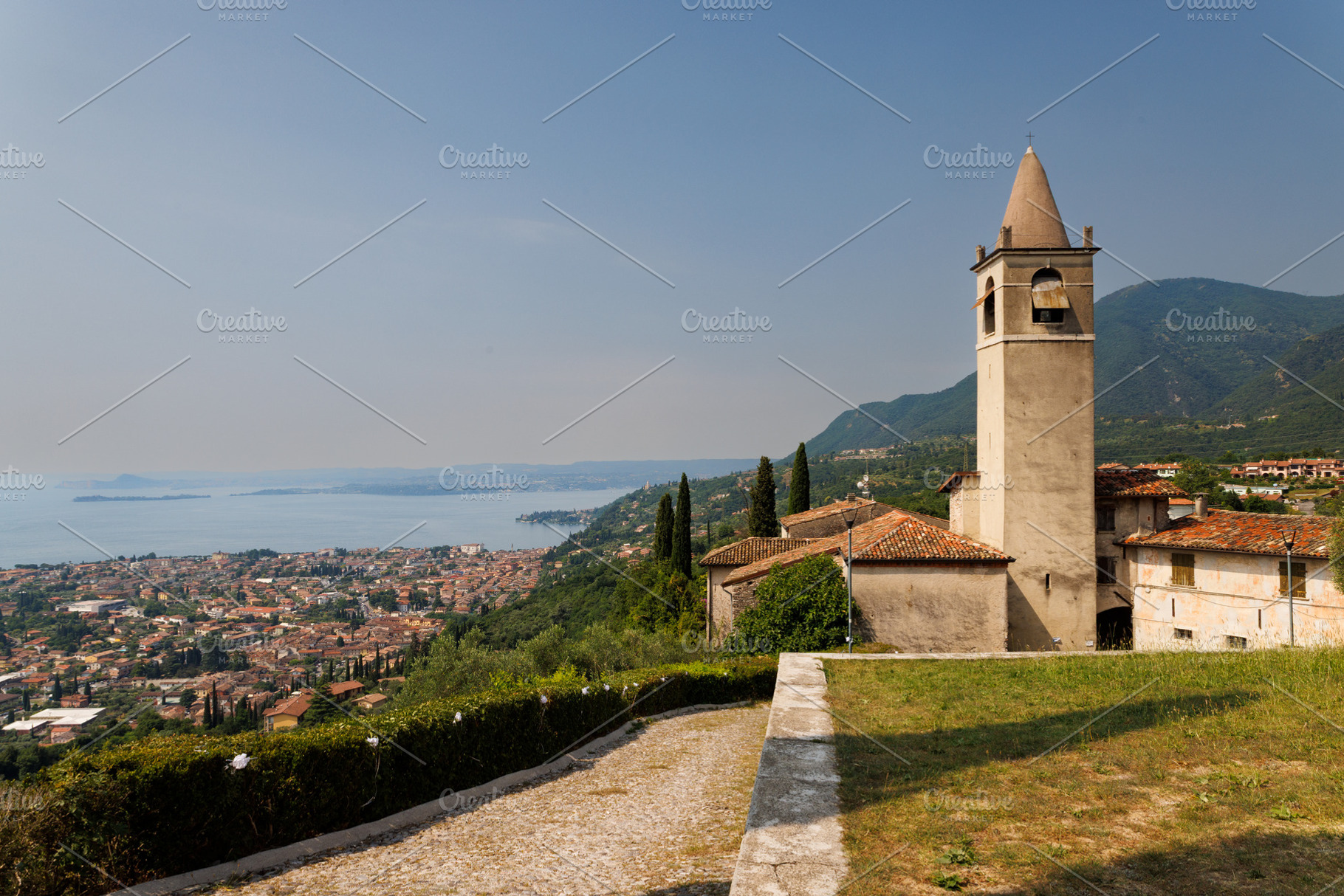 Bell tower of the parish church of San Michele Arcangelo, Lake Garda, Italy, an Architecture Photo by Bepslabor