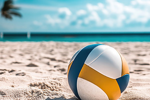 A bright volleyball sits on the soft, golden sand at a beach wit, a Sports & Recreation Photo by AlyaAnd