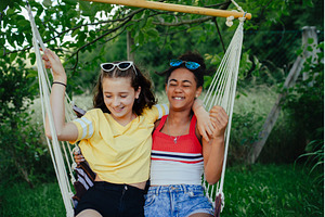 Teenage girls friends outdoors in, a Person Photo by HalfPoint