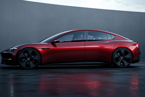 Red electric car under gray sky, a Photo by Beautiful things