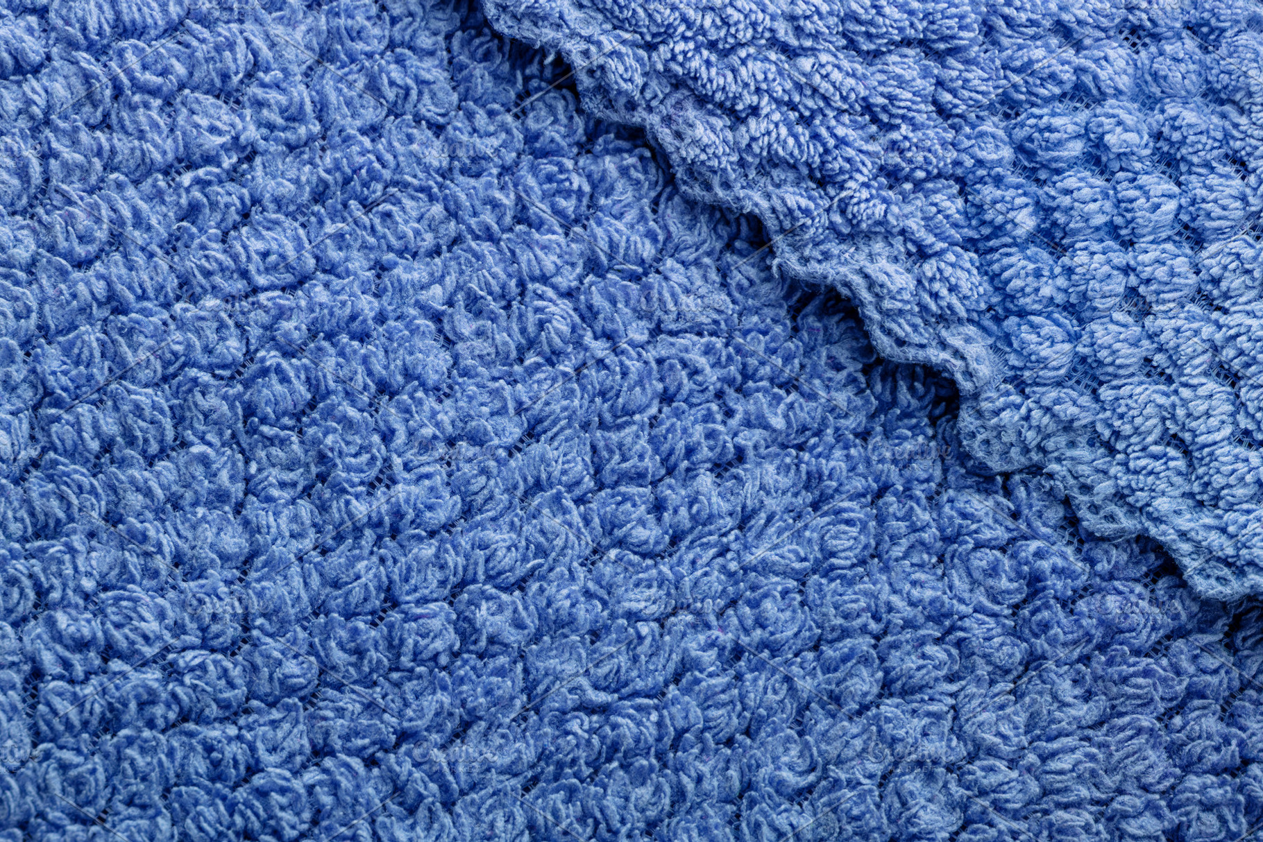 Close-up of soft blue towel fabric with rich texture, suitable f, a Background Photo by Ales Munt